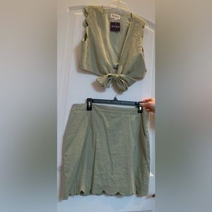 Never worn before. Beautiful two piece green set. Purchased at a boutique